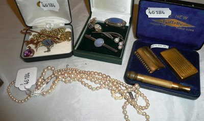 Lot 327 - Two strands of cultured pearls, four brooches, chains, earrings, a pendant, coins etc