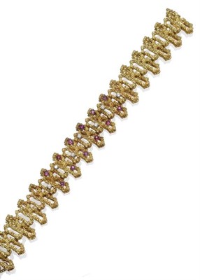 Lot 289 - A Ruby and Diamond Bracelet, of textured links, set with round brilliant cut diamonds and round cut