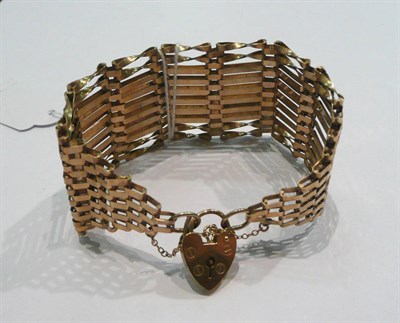 Lot 347 - A wide gate bracelet