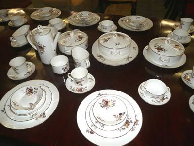 Lot 376 - A Royal Worcester ten setting dinner service including tureens, coffee pot etc