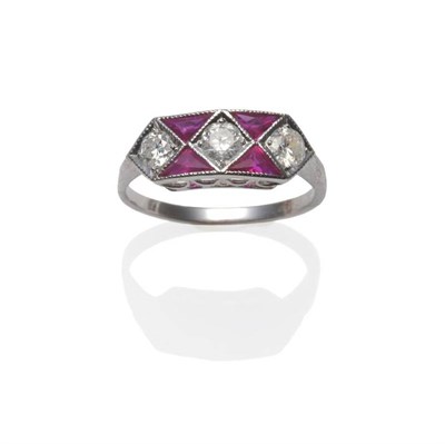 Lot 294 - An Art Deco Style Ruby and Diamond Ring, three old cut diamonds set with triangular cut rubies,...