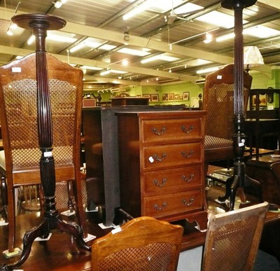 Lot 463 - A reproduction four height chest of drawers, two mahogany plant stands and a reproduction...