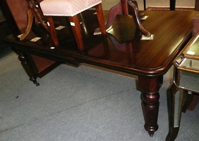 Lot 482 - A Victorian mahogany wind out dining table