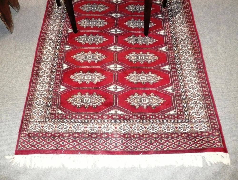 Lot 491 - Bokhara rug Probably Lahore, the blood red
