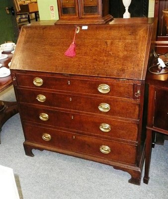 Lot 502 - A Georgian oak bureau