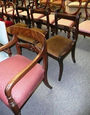 Lot 511 - A set of three mahogany bar back dining chairs and a mahogany bar back elbow chair