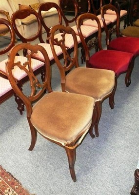 Lot 512 - A pair of Victorian walnut chairs and a pair of Victorian rosewood balloon back dining chairs