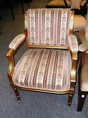 Lot 522 - A French Louis XV style fauteuil