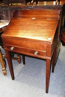 Lot 554 - Late Georgian oak and ash clerks desk