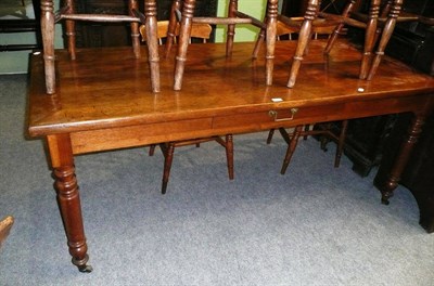 Lot 555 - An oak kitchen table