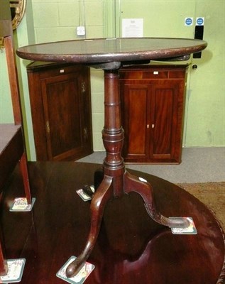 Lot 563 - A George III mahogany tip top table