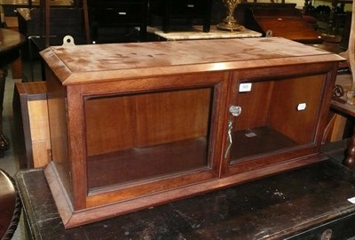 Lot 565 - A hanging glazed mahogany cupboard