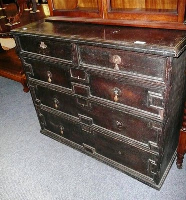 Lot 566 - An 18th century oak four height chest