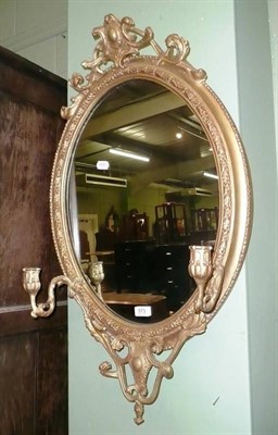 Lot 573 - A gilt girandole mirror