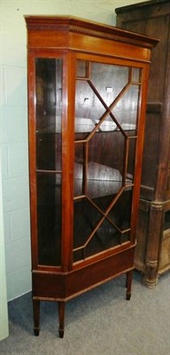 Lot 575 - A mahogany corner display cabinet