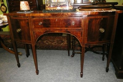 Lot 591 - A late 19th century mahogany break front sideboard