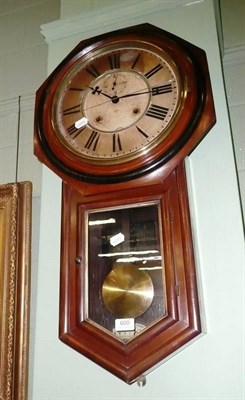 Lot 600 - An Ansonia drop dial wall clock with octagonal case, painted dial, two winding apertures