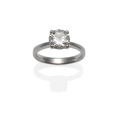 Lot 315 - An 18 Carat White Gold Diamond Solitaire Ring, the round brilliant cut diamond in a four claw...