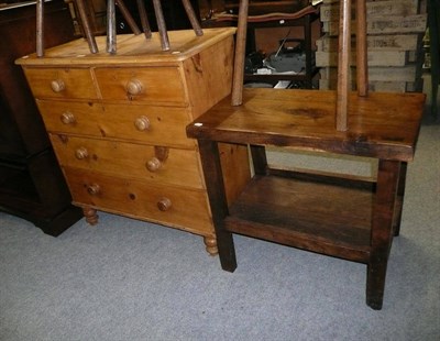 Lot 659 - A pine four height chest and an oak two tier table