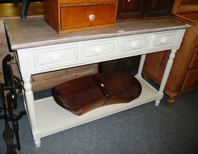 Lot 662 - Painted four drawer table