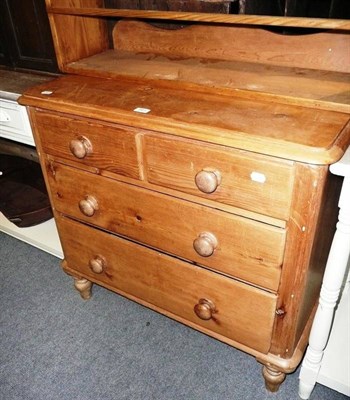 Lot 663 - A pine three height chest with raised up stand