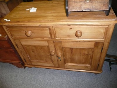 Lot 674 - A pine kitchen cupboard