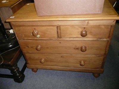 Lot 680 - A pine three height chest of drawers