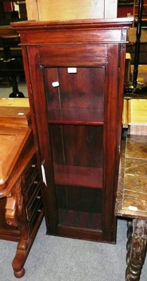 Lot 691 - A glazed stained pine cabinet