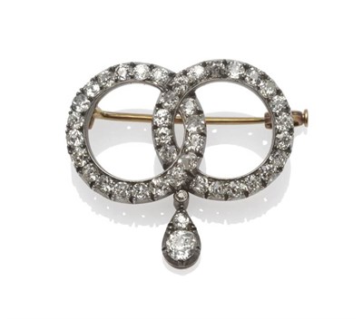 Lot 330 - A Diamond Brooch, circa 1880, two entwined loops set with old cut diamonds suspend a pear...