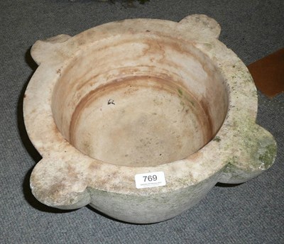 Lot 769 - A large carved stone mortar