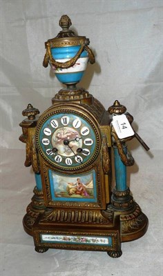Lot 14 - A gilt metal striking porcelain mounted mantel clock