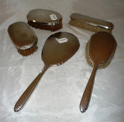 Lot 31 - Composite silver mounted brush set and hand mirror