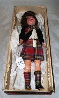 Lot 32 - An Armand Marseille Scottish costume doll in original tartan box