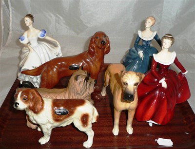 Lot 49 - Three Royal Doulton figures, Royal Doltan terrier, Coopercraft dogs etc