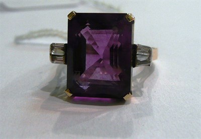Lot 71 - An amethyst and diamond set dress ring