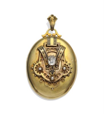 Lot 340 - A Victorian Locket, the yellow body with a decorative overlay, with black enamel decoration,...