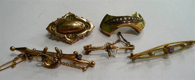Lot 99 - Two Victorian brooches (a.f.) and three bar brooches, including one set with sapphire and seed...
