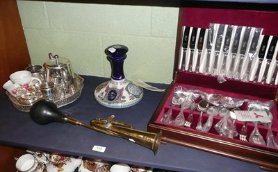 Lot 110 - Silver plated canteen of cutlery, Wade Pussers Rum decanter, horn, German shaving mug, plated...