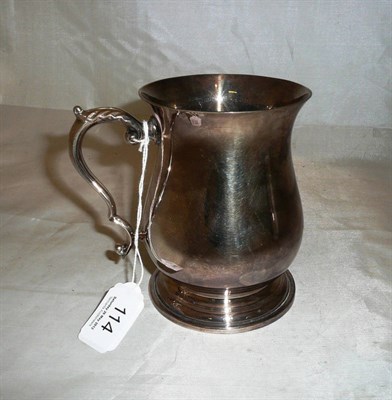 Lot 114 - A silver baluster shaped mug