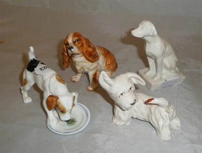 Lot 121 - Two Royal Doulton dog groups, Beswick Terrier with ladybird to tail and a spaniel
