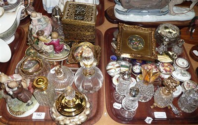 Lot 142 - Two trays of assorted modern decorative cut and moulded glass dressing table items, hinged...