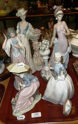 Lot 145 - Two large Lladro figure groups and three Nao figures