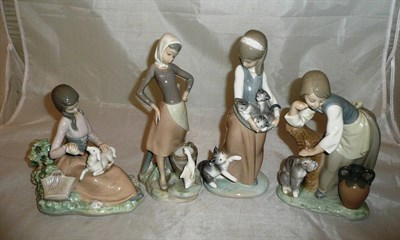 Lot 146 - Four Lladro figure groups of young girls with farm animals