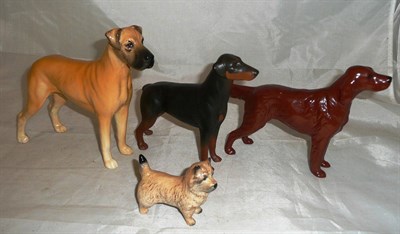 Lot 155 - Four Beswick dogs