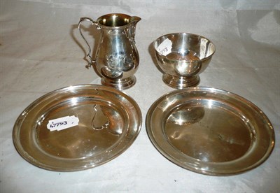Lot 159 - Two sterling silver side plates, cream jug and bowl (4)