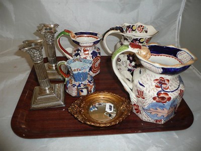 Lot 170 - A pair of silver mounted candlesticks (a.f.), four ceramic jugs, copper warmer and a small mirror