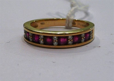 Lot 179 - An 18ct gold ruby and diamond ring