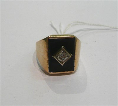 Lot 181 - A diamond set signet ring, shank stamped '10k'