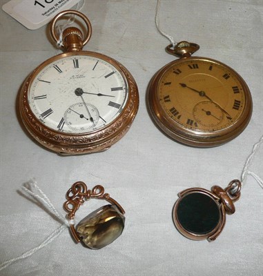 Lot 186 - A gilt metal Waltham pocket watch, another and two fobs