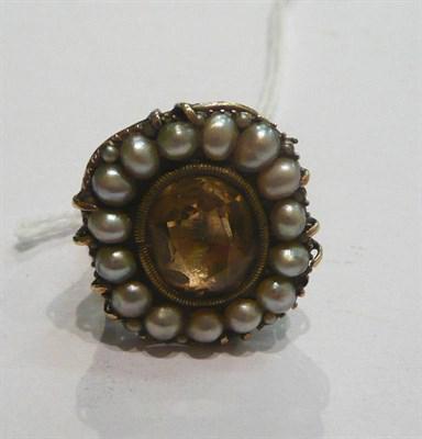 Lot 191 - A foil backed citrine and pearl cluster on a ring mount